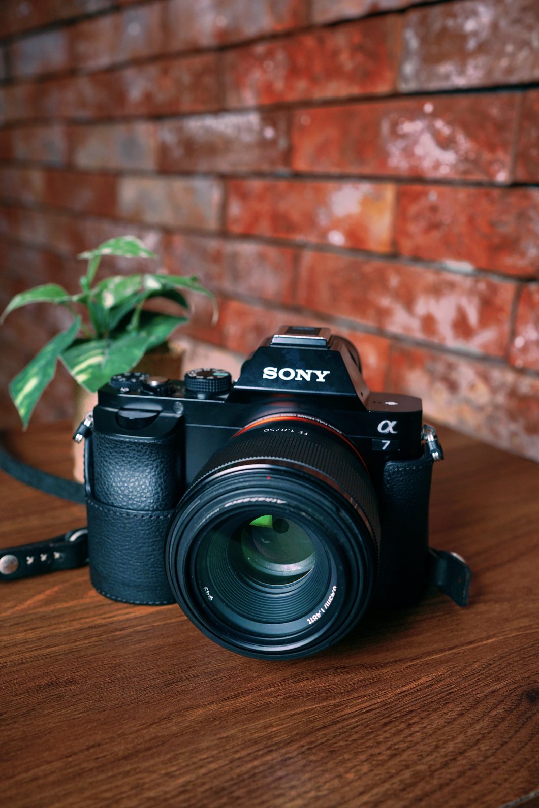 A Camera on a Wooden Surface 